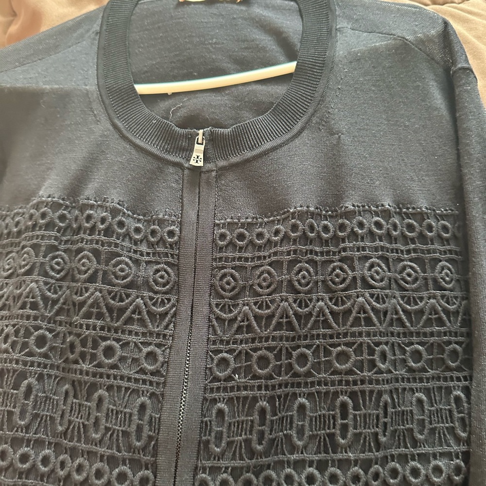 Tory Burch black sweater with full zipper. Worn once. Excellent condition